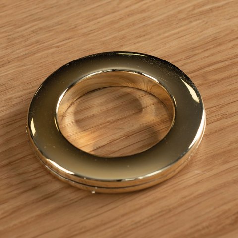 Przelotka plastikowa Uniwersalna, 10szt.,śr wew 35,5mm zewn. 57,5mm, kolor mosiądz 031 PRZELO/PLA/031/004004/1